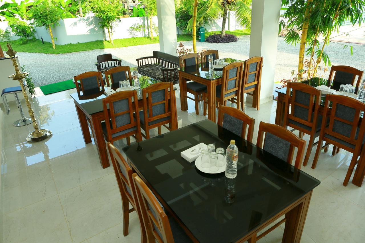 Global Backwater Resort Kollam Bagian luar foto